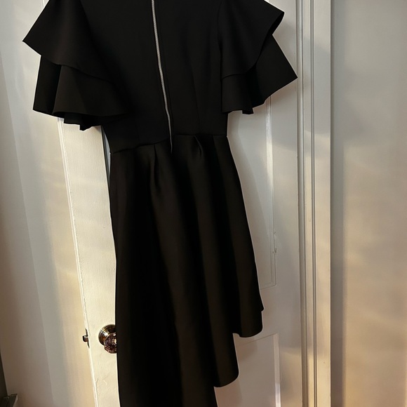 Black dress with ruffles on sleeve NWT never been worn I purchased 2 diff sizes - Picture 3 of 3